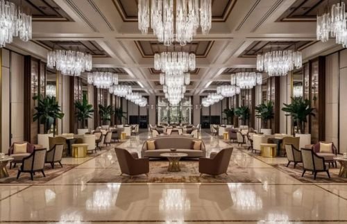 Luxurious lobby with elegant chandeliers.